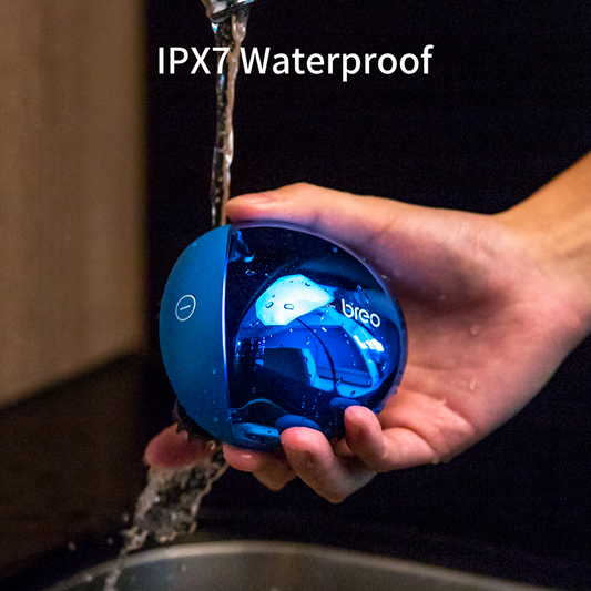 Waterproof Breo Scalp Mini massager, electric head massager, blue design for hair growth and relaxation.