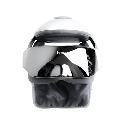Breo iDream 3 head massager, white and black design for eye and neck relaxation.